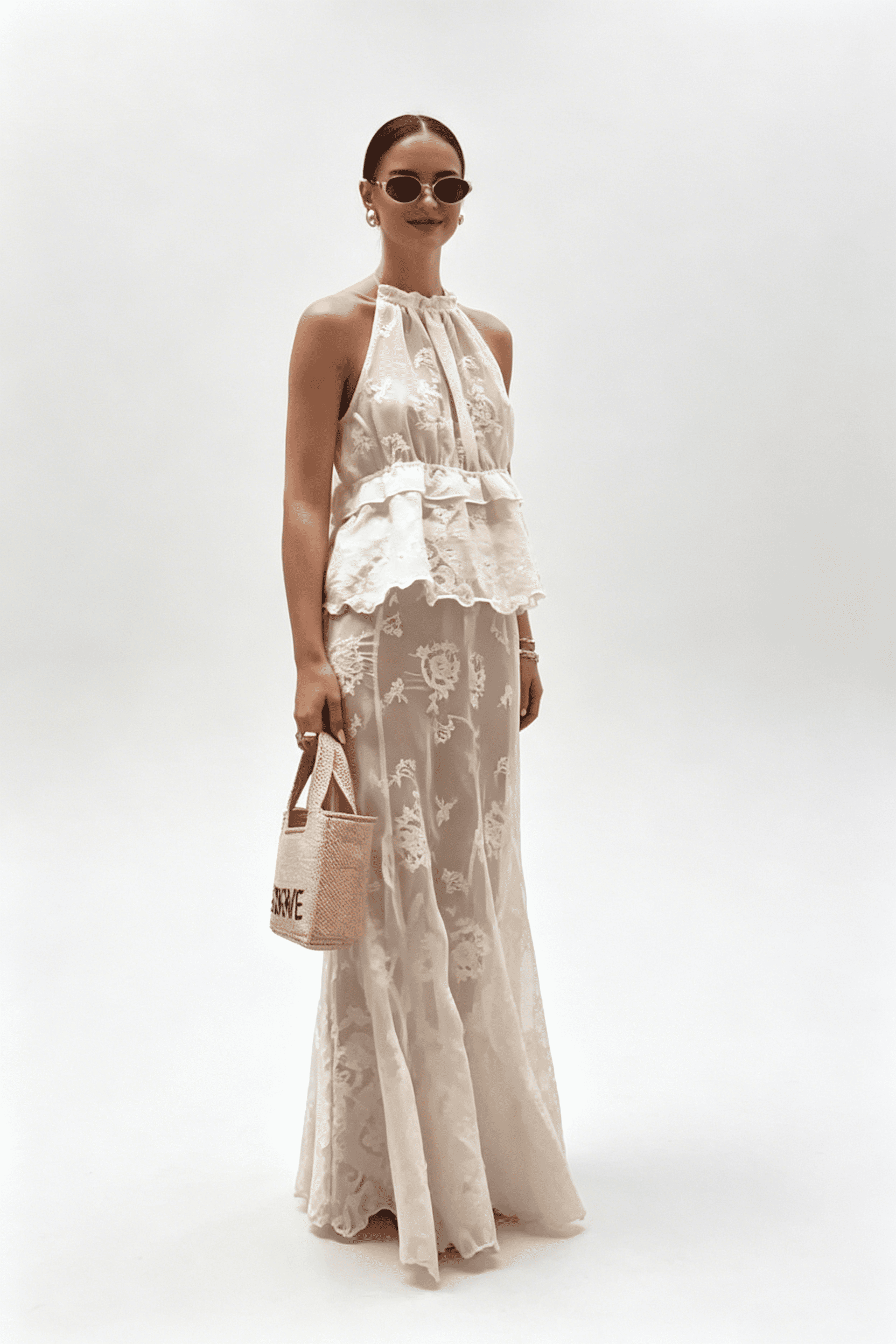 Completo con gonna aderente in pizzo e top senza maniche con collo all'americana e vita alta