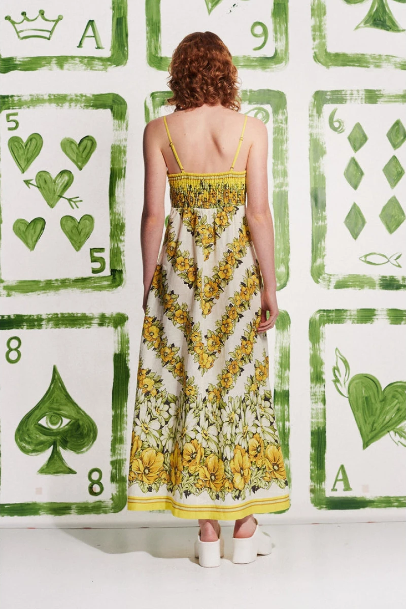 Robe longue fleurie à fines bretelles Tristane en jaune