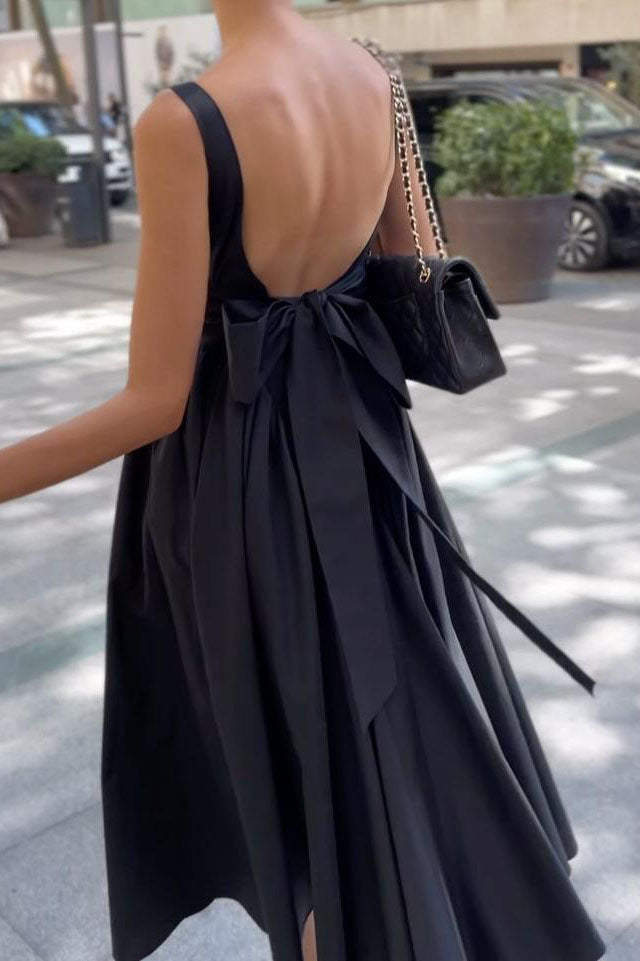 ファッション気質のリボンバックレスドレス