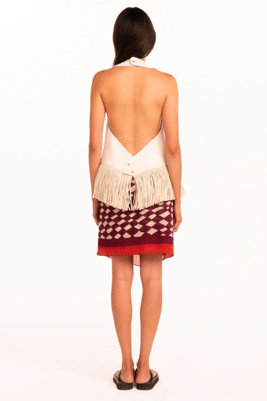 Top a collo halter con frange e schiena scoperta
