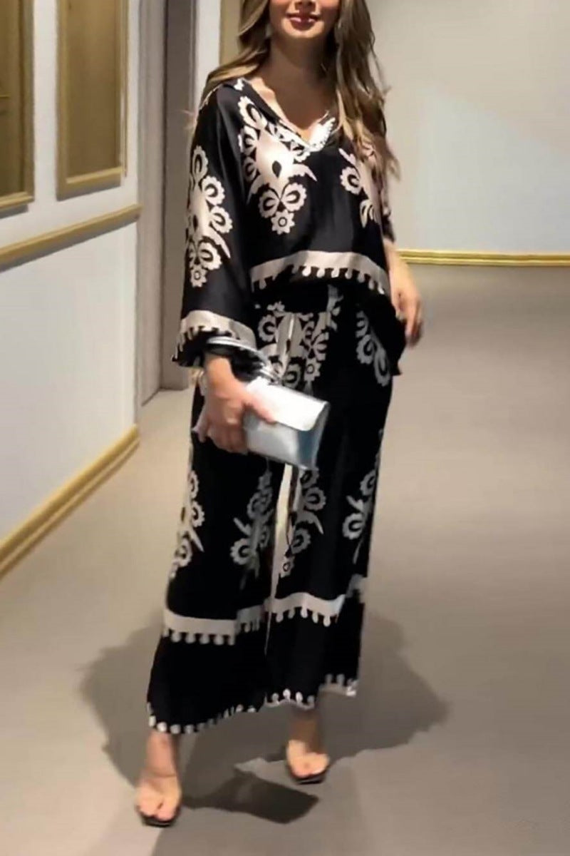 Conjunto de pantalones largos con top de manga larga irregular y estampado único