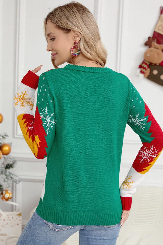 PULL EN TRICOT AVEC TRAÎNEAU DE PÈRE NOËL ET DE RENNES