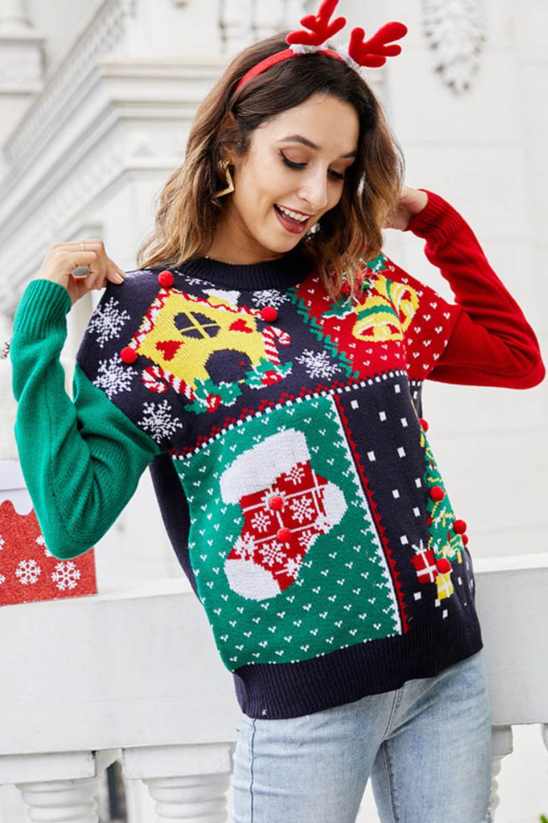 Maglione lavorato a maglia con albero di Natale e fiocco di neve