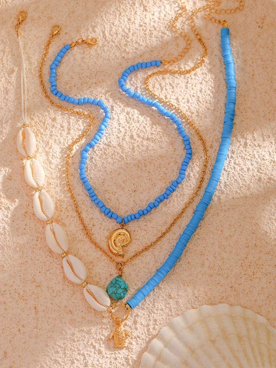 Bora Bora Multi-Schicht Muschelkugel-Halskette Gold