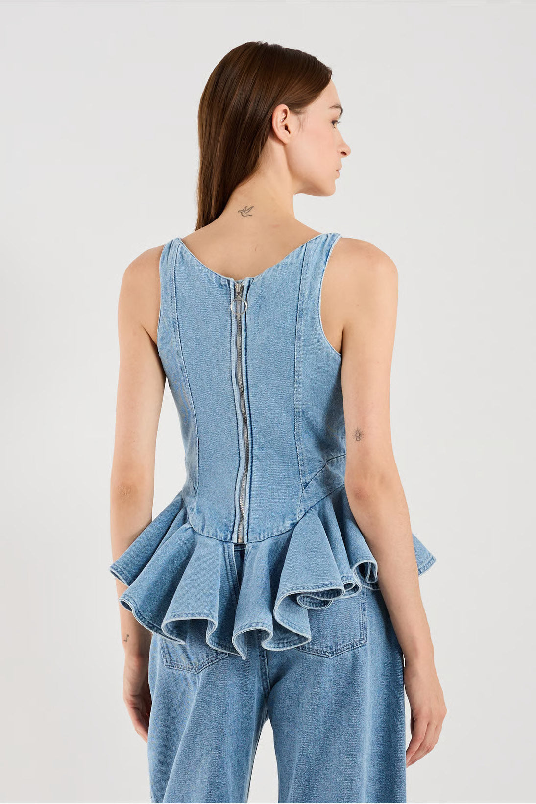 Top en denim style corset avec basque