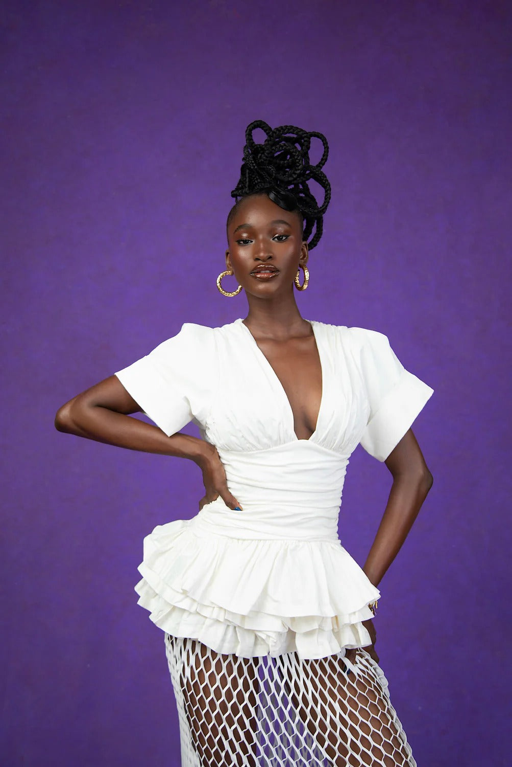 Witte top met diepe halslijn en peplum