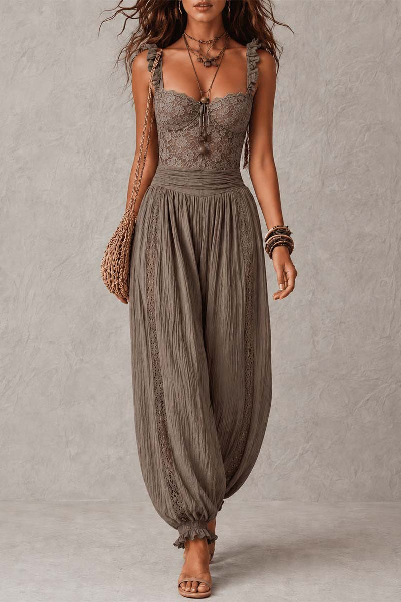 Mini abito in finta pelle scamosciata con nappine e stile halter