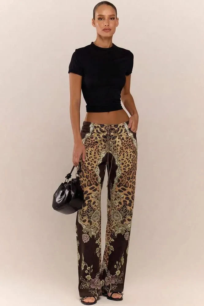 Pantaloni a vita bassa con stampa leopardata e allacciatura in pizzo